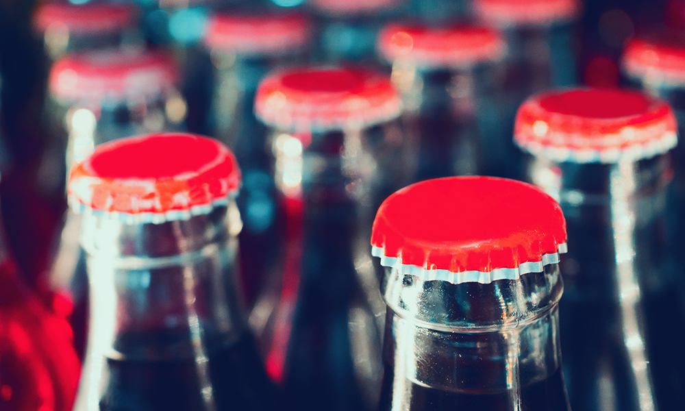 Coca-Cola turns to refillable glass bottles in fight against